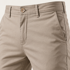 Close view of the waistband, button and pocket on the khaki chino
