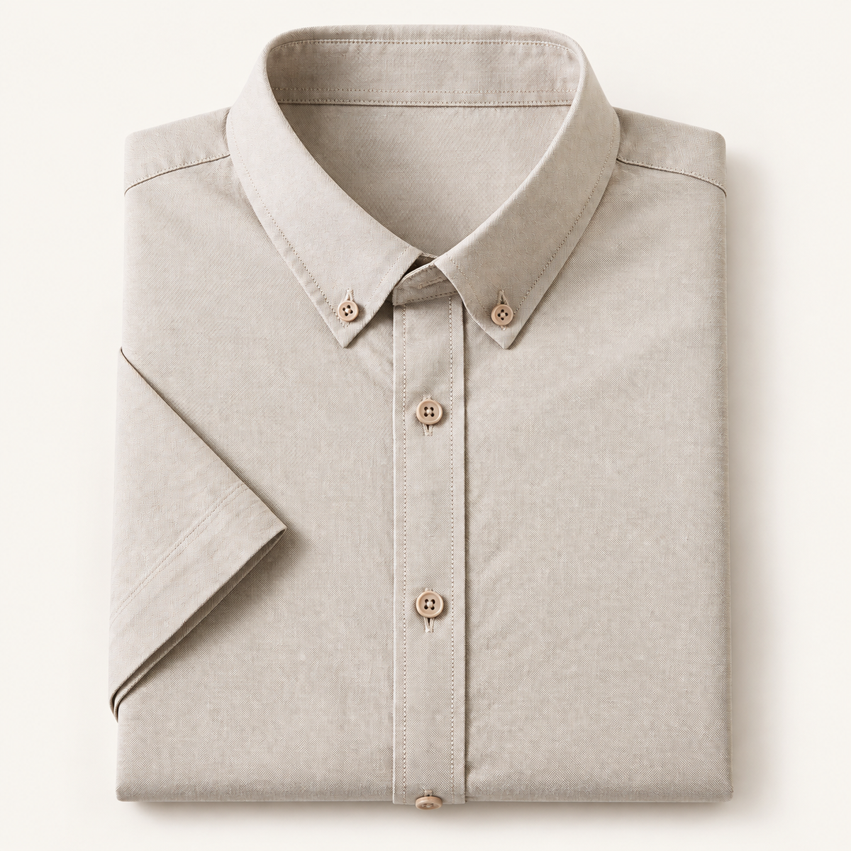 Cotton oxford short sleeve shirt in taupe, folded, front view