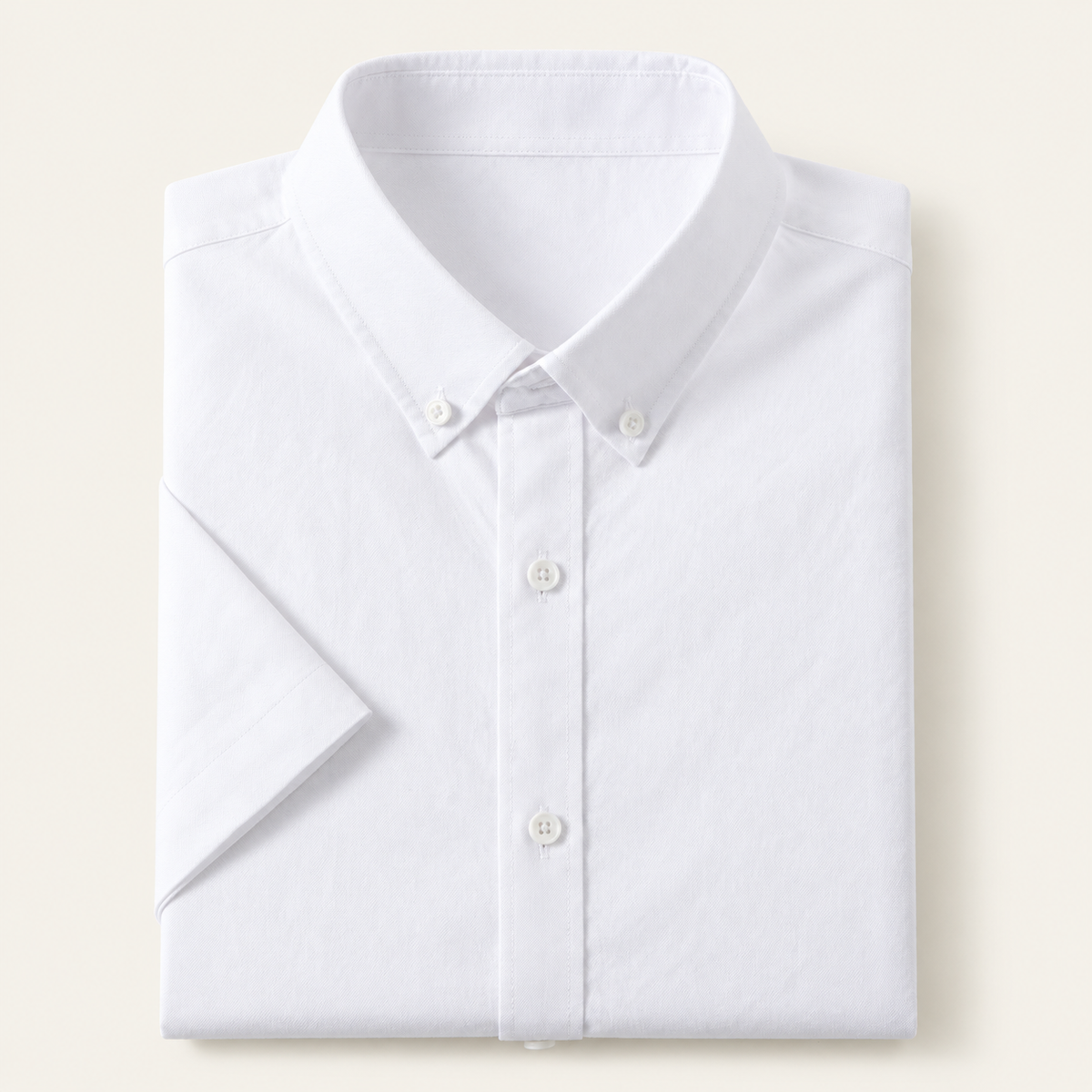 Cotton oxford short sleeve shirt in white, folded, front view